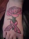 carnation with breast cancer ribbon tattoo