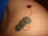 flower/ ladybug tattoo