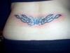 tribal low back tattoo