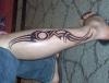 tribal leg tattoo