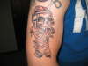 Pushead "One" tattoo
