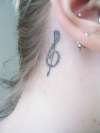 Treble Clef behind ear tattoo