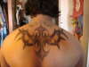 kalen's tribal cross tattoo