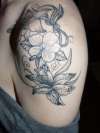 Shoulder flowers tattoo