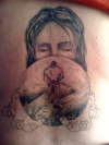 Jesus watches tattoo
