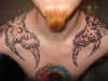 Wings-front view tattoo