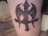 satanic cross with wings tattoo