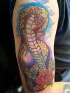 Snake coverup tattoo
