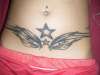 Stars and tribal tattoo