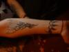 Tribal right arm tattoo