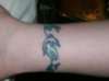 Dolphin ankle tat tattoo