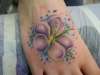 foot  flower tattoo