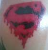 bleeding superman tattoo