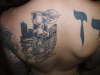 Boston skyline and Hebrew lettering tattoo