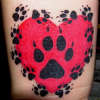Paw Prints Over Heart tattoo