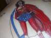 close up of wonder woman tat tattoo