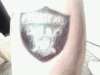 Raiders symbol tattoo