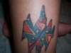 Rebel Tat tattoo