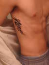 tribal/music tattoo