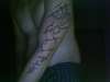 Cross An Rosery tattoo
