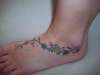 Daisy Vine Foot Tattoo