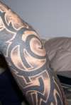 Original Tripped out tribal arm sleeve tattoo