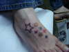 STARS IN FOOT tattoo