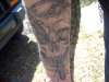 skull and termites tattoo