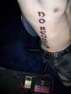 No Regrets tattoo