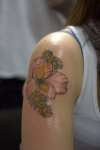 Arm Flowers tattoo