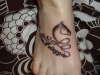 Italian phrase and profile of a horsehead 2 tattoo
