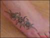 tribal mix, left foot tattoo