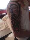 Right arm tribal tattoo