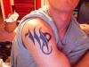 Tribal Virgo tattoo