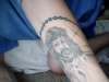 jesus and top of rosarie beads tattoo