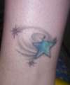 star with black swirlies. tattoo