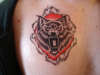 tear-away wolf tattoo