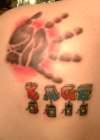 My son's handprint and name, tattoo