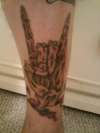 Metal hand skeleton tattoo