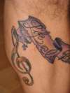 Music notes tattoo