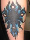 blue tribal cover up tattoo