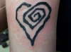 Manson heart tattoo