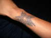 tribal star tattoo