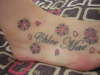 my parteners foot tattoo with our daughters name