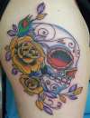 suger skull with flowers tattoo