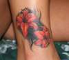 flowers on ankle tattoo
