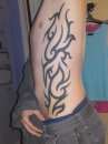 tribal down my side tattoo