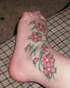 Cherry Blossoms on my left ankle and foot. tattoo