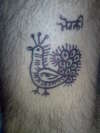 Morni "A Peahen" tattoo