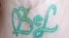 Son's initials tattoo